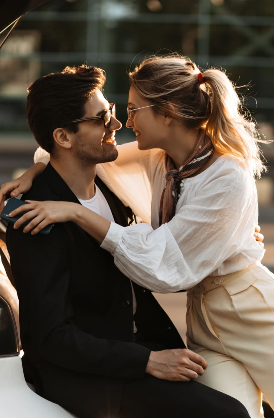 man and woman hugging